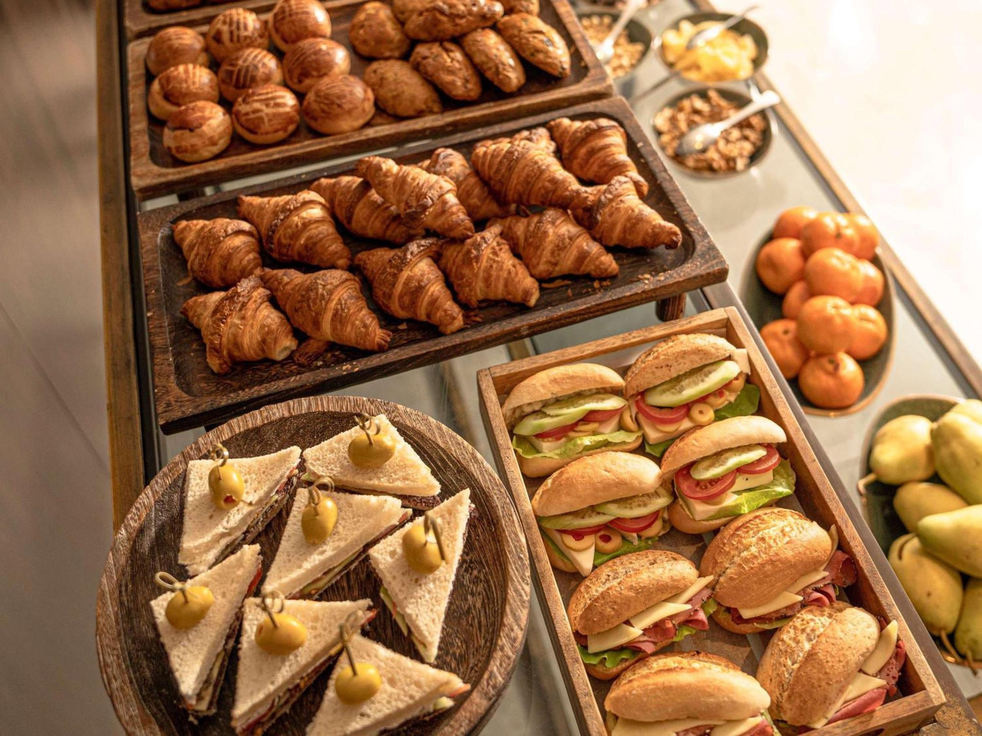 The Galata Istanbul Hotel Mgallery Exteriör bild A selection of sandwiches and pastries